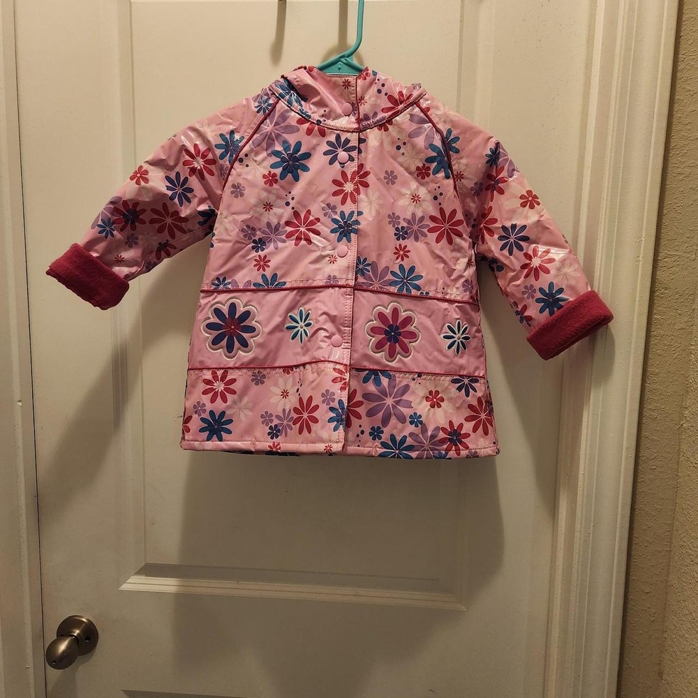 Wippette Girl's Pink Raincoat with red, blue, and white flowers